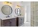 Modern bathroom with double vanity and glass block shower at 37020 N 31St Ave, Phoenix, AZ 85086