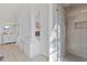 Modern bathroom with a walk-in shower and marble flooring at 37020 N 31St Ave, Phoenix, AZ 85086