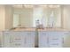 Bright bathroom boasts double vanity and large mirror at 37020 N 31St Ave, Phoenix, AZ 85086