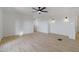 Bright bedroom with light wood floors and ceiling fan at 37020 N 31St Ave, Phoenix, AZ 85086