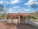 Front view of house with a porte cochere entrance during daytime at 37020 N 31St Ave, Phoenix, AZ 85086