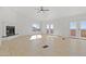 Bright living room with hardwood floors, fireplace, and large windows at 37020 N 31St Ave, Phoenix, AZ 85086