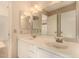 Bathroom features a double sink with a full-sized mirror and a bright neutral design at 3801 E Kent Dr, Phoenix, AZ 85044