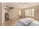 Cozy bedroom with large window, closet, and neutral carpeting creates a comfortable living space at 3801 E Kent Dr, Phoenix, AZ 85044