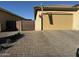 Brick paved driveway leading to a two-car garage at 41262 W Almira Dr, Maricopa, AZ 85138