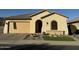 One-story home with a two-car garage and landscaped front yard at 41262 W Almira Dr, Maricopa, AZ 85138