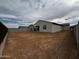 New construction backyard showing the home's exterior and stucco finish at 4328 E Bradford Ave, San Tan Valley, AZ 85140