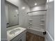 Bathroom featuring a vanity with sink and shower-tub combo at 4328 E Bradford Ave, San Tan Valley, AZ 85140