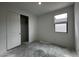 Cozy bedroom with closet and window, featuring natural light and neutral walls at 4328 E Bradford Ave, San Tan Valley, AZ 85140