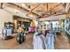 An interior view of the pro shop featuring golf apparel, equipment, and a rustic vaulted ceiling with exposed wood beams at 4439 E Ficus Way, Gilbert, AZ 85298