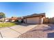 Charming home with a well-maintained front yard and a two-car garage at 4507 E Towne Ln, Gilbert, AZ 85234