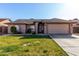 Charming home featuring a well-manicured lawn and a two-car garage at 4507 E Towne Ln, Gilbert, AZ 85234