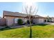 Inviting front yard featuring a green lawn and a well-maintained garden at 4507 E Towne Ln, Gilbert, AZ 85234