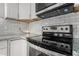 This kitchen features modern appliances, granite countertops, and subway tile backsplash at 4507 E Towne Ln, Gilbert, AZ 85234