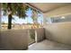 Covered patio with gated access and tree views at 4644 N 22Nd St # 1017, Phoenix, AZ 85016