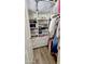 Organized closet with shelving and hanging space for clothes and shoes at 5840 S Pico St, Gilbert, AZ 85298