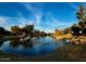 Scenic community lake with ducks and a waterfall at 5840 S Pico St, Gilbert, AZ 85298