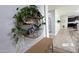 Entryway with a circular shelf and a console table at 5840 S Pico St, Gilbert, AZ 85298