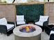 Cozy patio with fire pit and comfortable seating at 5840 S Pico St, Gilbert, AZ 85298