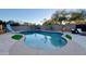 Inviting backyard pool with a slide and patio furniture at 5840 S Pico St, Gilbert, AZ 85298