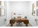 Bright home office with wood desk and whiteboard at 6166 N Scottsdale Rd # C2008, Paradise Valley, AZ 85253