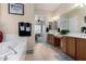 Main bathroom with double vanity, garden tub, and separate shower at 6615 W Sandpiper Ct, Florence, AZ 85132