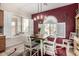 Charming dining room with a round table and chairs, and a view of the kitchen at 6615 W Sandpiper Ct, Florence, AZ 85132