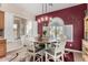 Charming dining room with a round table and chairs, and a view of the kitchen at 6615 W Sandpiper Ct, Florence, AZ 85132