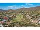 Aerial view of a luxury home next to golf course at 7130 E Saddleback St # 11, Mesa, AZ 85207