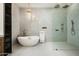 Modern bathroom with free-standing tub and large shower at 7130 E Saddleback St # 11, Mesa, AZ 85207