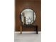 Stylish entryway with a large circular mirror and console table at 7130 E Saddleback St # 11, Mesa, AZ 85207