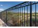 Ornate black fence with golf course view at 7130 E Saddleback St # 11, Mesa, AZ 85207