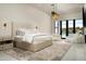 Luxurious main bedroom with plush bedding and pool view at 7130 E Saddleback St # 11, Mesa, AZ 85207