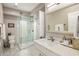 Elegant bathroom with a frameless shower and quartz vanity at 7439 E Beryl Ave, Scottsdale, AZ 85258