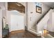 Bright foyer with high ceilings, hardwood floors, and staircase at 7439 E Beryl Ave, Scottsdale, AZ 85258