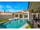 Stunning pool and spa with outdoor seating and dining at 7439 E Beryl Ave, Scottsdale, AZ 85258