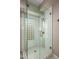 Large shower with glass enclosure and stylish tile detail at 7439 E Beryl Ave, Scottsdale, AZ 85258