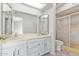 Bathroom boasts double sinks, shower, and separate toilet at 753 W Pampa Ave, Mesa, AZ 85210