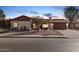 Single-story home with red-tiled roof and attached garage at 753 W Pampa Ave, Mesa, AZ 85210