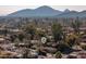 Aerial view of a home with mountain backdrop, showcasing the surrounding neighborhood at 7605 E Via De Lindo --, Scottsdale, AZ 85258