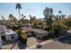 Aerial view of single-story home with landscaped yard and pool; located in a quiet residential neighborhood at 7605 E Via De Lindo --, Scottsdale, AZ 85258