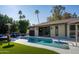 Inviting kidney-shaped pool with artificial turf at 7605 E Via De Lindo --, Scottsdale, AZ 85258