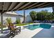 Relaxing pool area with patio furniture and covered patio at 7605 E Via De Lindo --, Scottsdale, AZ 85258