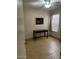 Bedroom with tile floor, ceiling fan, and a writing desk at 8553 N 112Th Ave, Peoria, AZ 85345