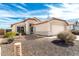 Charming single-story home featuring a two car garage and low maintenance front yard at 8553 N 112Th Ave, Peoria, AZ 85345