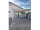 Covered patio with paver stones and a storage shed at 8553 N 112Th Ave, Peoria, AZ 85345