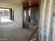 Interior view of a shipping container home under construction, showing unfinished rooms and exposed materials at 9428 N 9Th Ave, Phoenix, AZ 85021