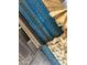 Stack of blue plywood sheets and lumber for construction at 9428 N 9Th Ave, Phoenix, AZ 85021