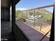 View from a container home window, showcasing the neighborhood and mountains at 9428 N 9Th Ave, Phoenix, AZ 85021