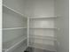 Large walk-in pantry with shelving at 9526 W Luxton Ln, Tolleson, AZ 85353